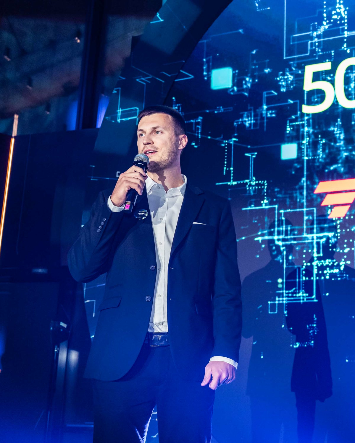 Antoni Kozelski on stage at Deloitte Technology Fast 50
