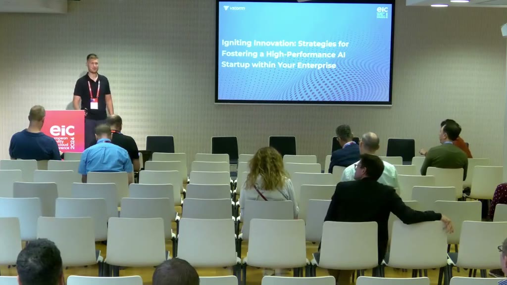 Antoni Kozelski presenting at EIC 2024 in Berlin, session slide on screen