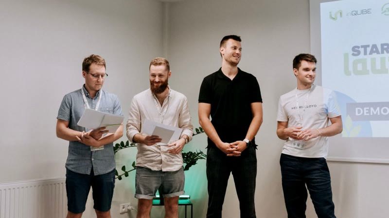 Antoni Kozelski with the three other jurors at the startup programme demo day
